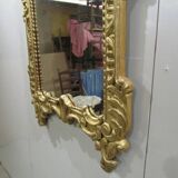 Miroir ancien en bois doré