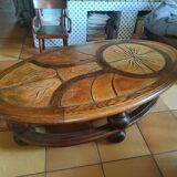 Ceramic and wood table in the shape of trees in the style of capron style