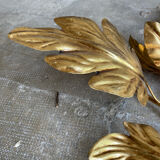 Golden wall lamp foliage