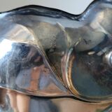 Old empty cut pocket in silver metal art nouveau in the shape of a sheet