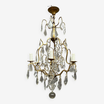 Louis XV style crystal chandelier.
