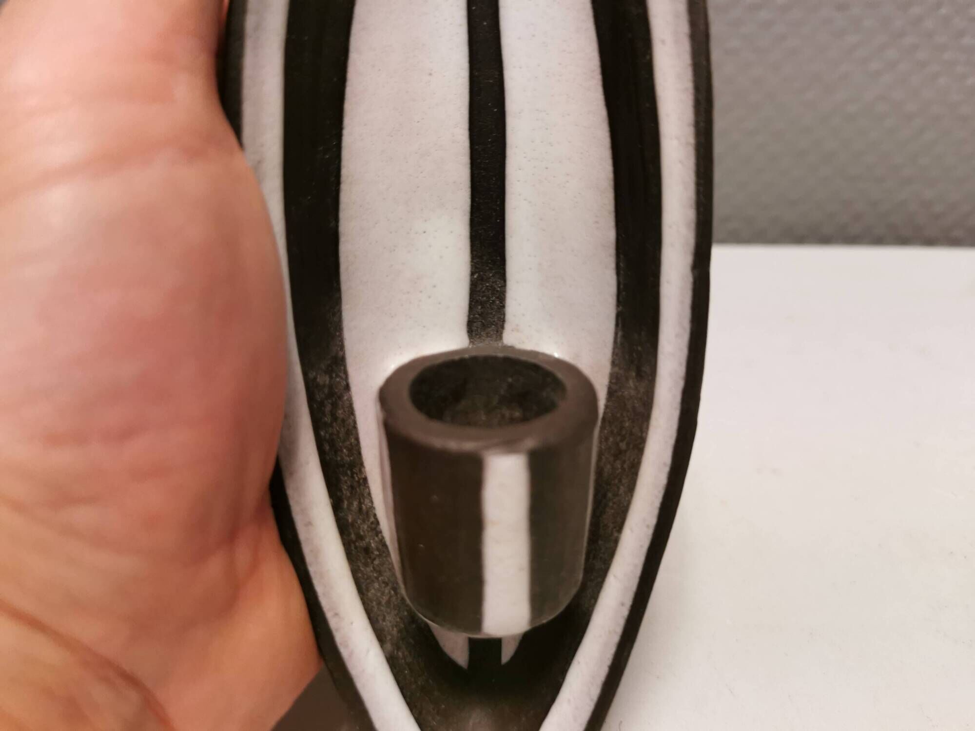 Wall-hung candle holder in the black series, made by Michael Andersen Bornholm Denmark 1960s