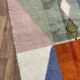 Handmade natural wool rug with colourful patterns 150/250 cm