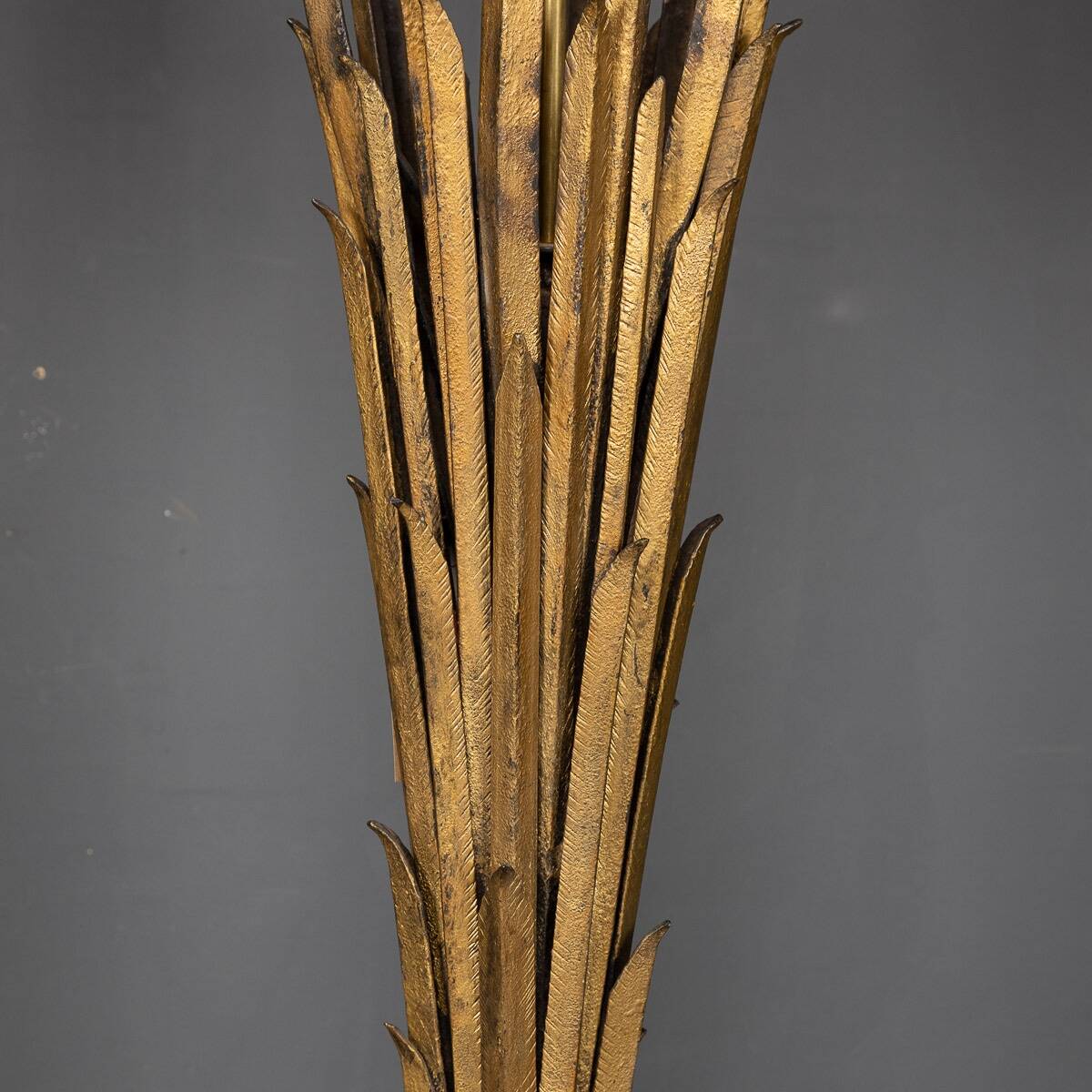A french gilt wrought iron floor lamp, attributed to maison bagues c.1970
