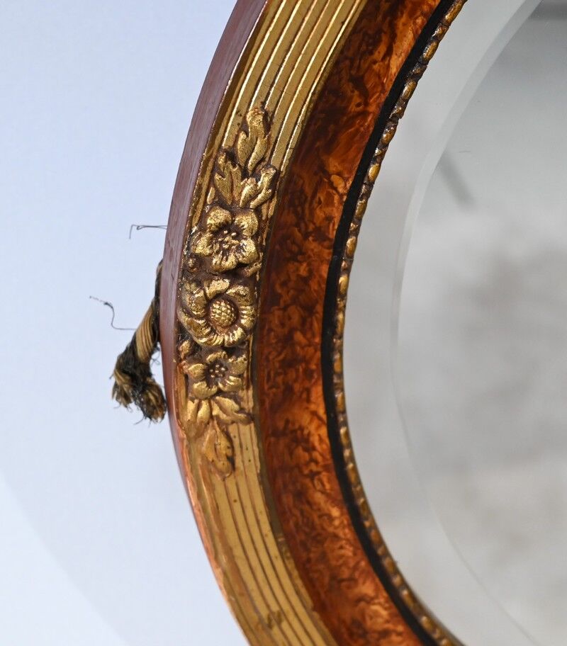 Oval mirror in gilded wood – early twentieth century
