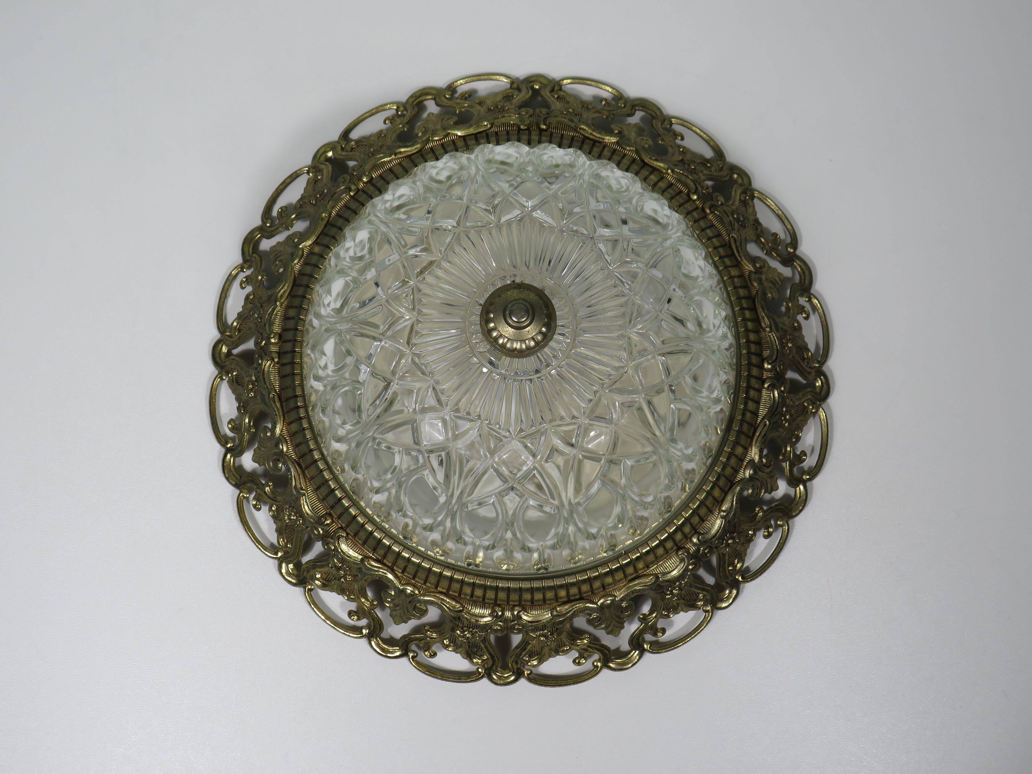 Hollywood Regency ceiling light, cut glass and openwork gold edge.