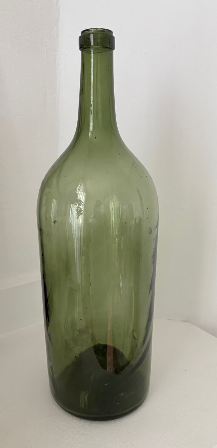 Pair of large antique blown glass bottles