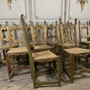 Set of 12 carved wooden chairs, Italy