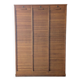 Old oak workshop furniture with curtains.