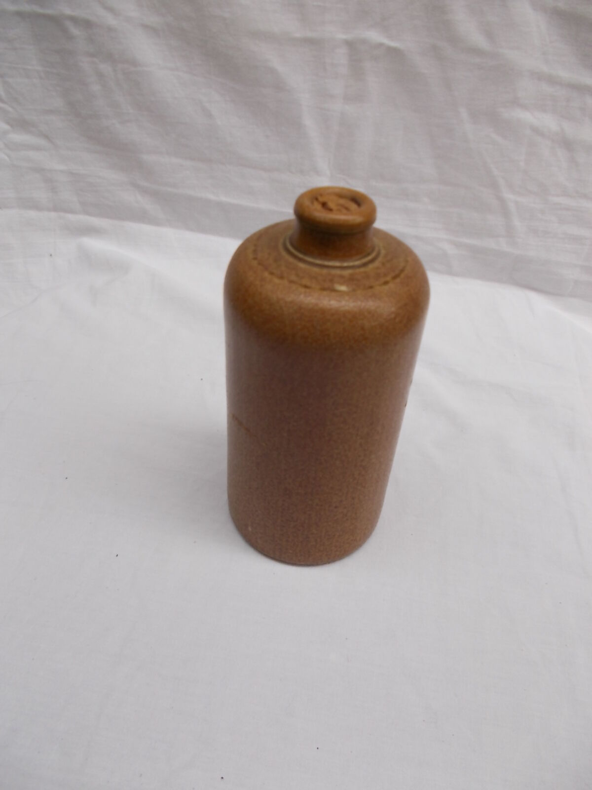 Light brown sandstone bottle