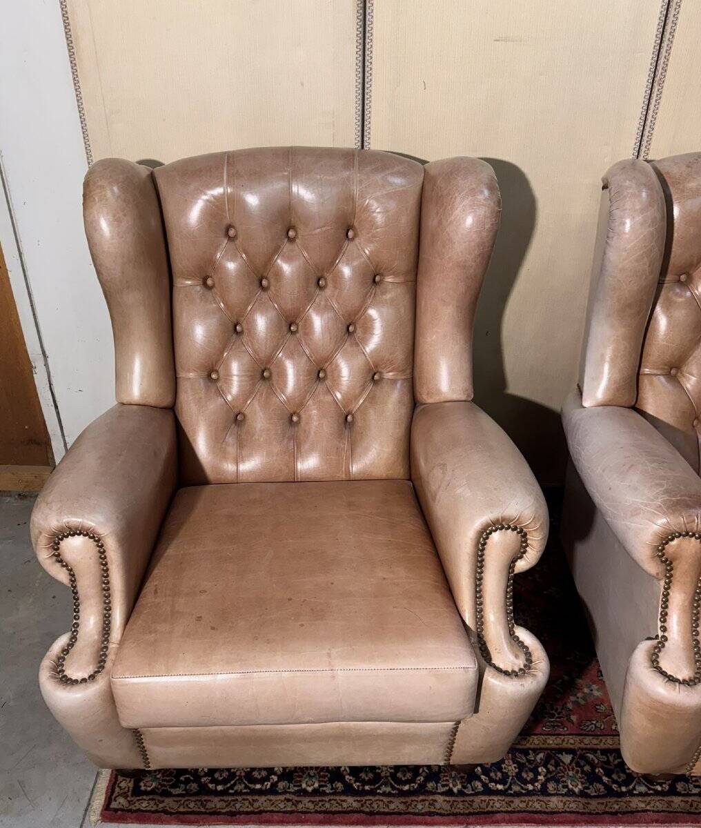 Pair of Chesterfield leather wingback armchairs