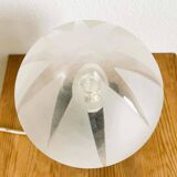 Small black wooden table lamp with frosted glass globe