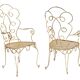 Pair of wrought iron and gilded armchairs, circa 1990