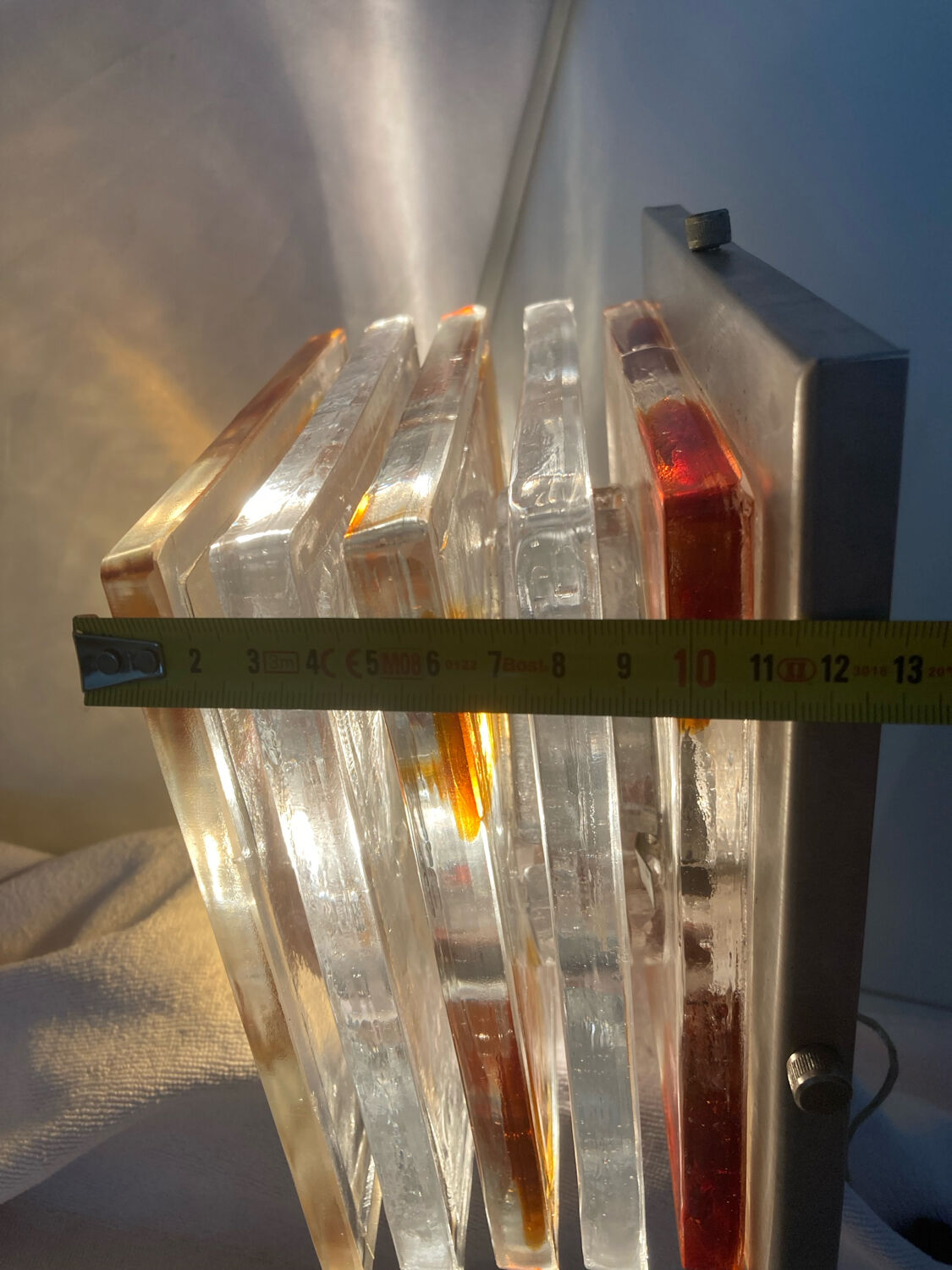 Transparent and smoky glass wall light for vintage Italian Poliarte.