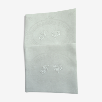 2 almond-green tinted napkins monogrammed F V