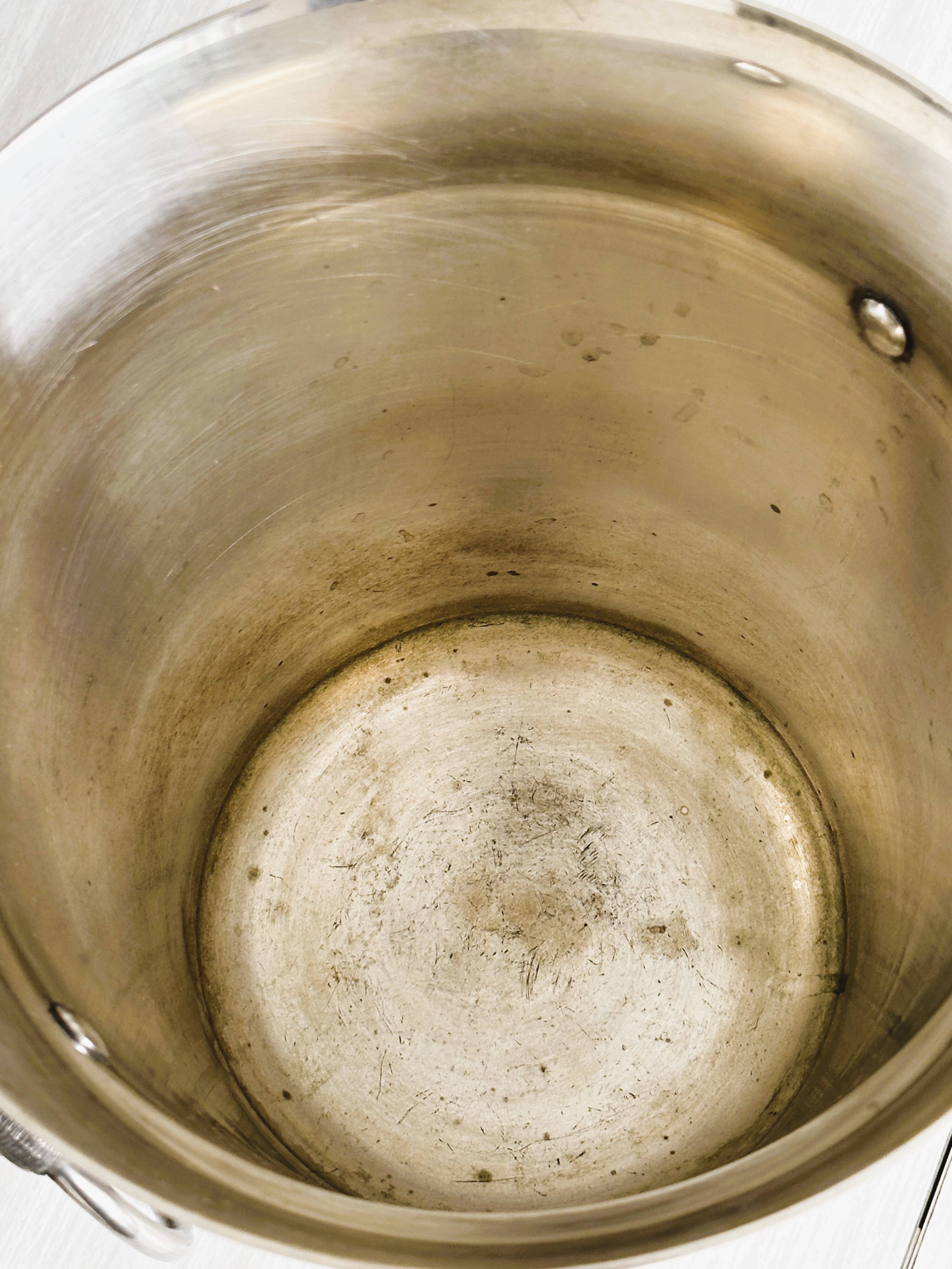Antique champagne bucket in shiny silver metal