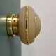 Vintage Art Deco globe wall/ceiling light in frosted yellow and gold glass.