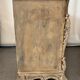 Commode arbalete baroque patinée