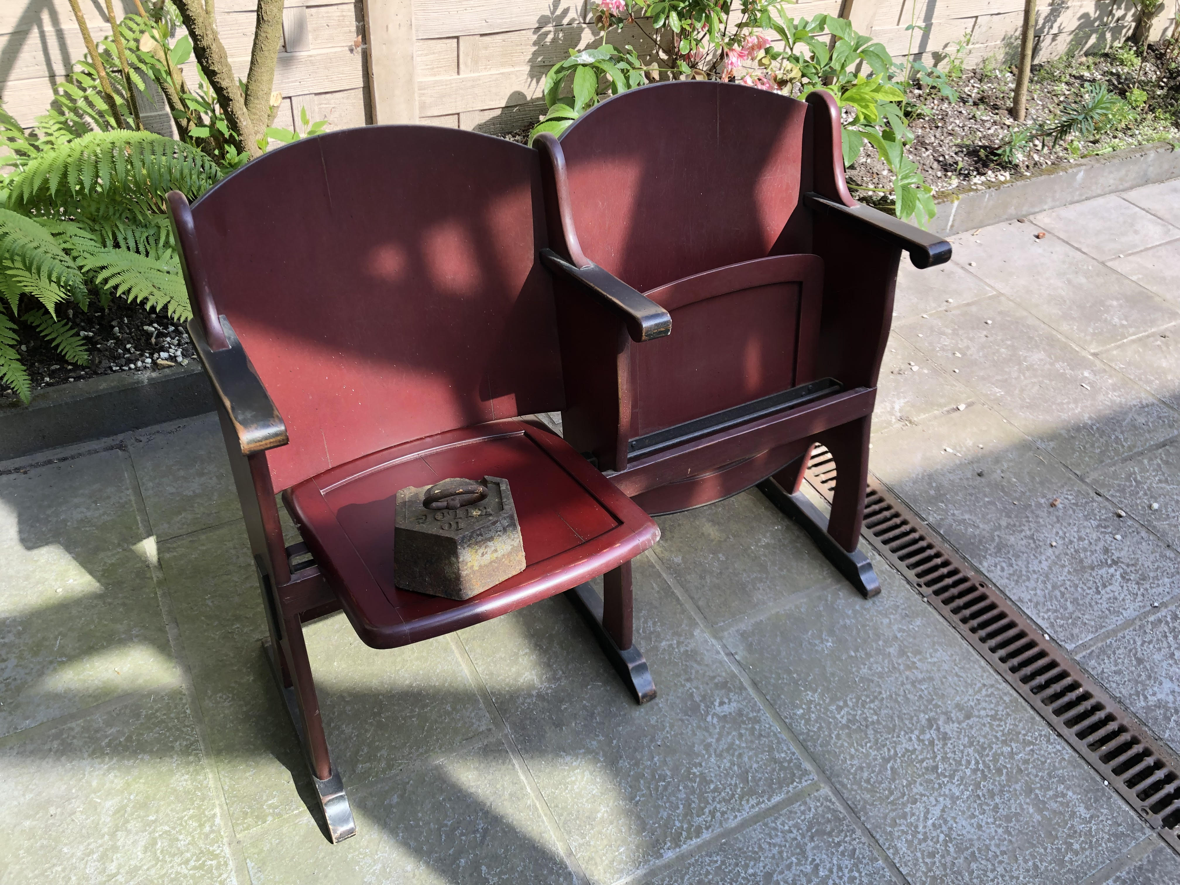 Folding seat two folding chairs from an old theatre