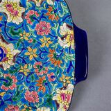 Plat à cake Longwy, décor floral et médaillon d’oiseaux, début XXème