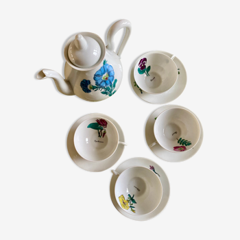 Service en porcelaine Limoges estampillé, théière et 4 tasses avec coupelles