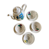 Porcelain service Limoges stamped, teapot and 4 cups with cups