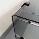 Vintage coffee table in smoked glass, black metal and cast aluminum