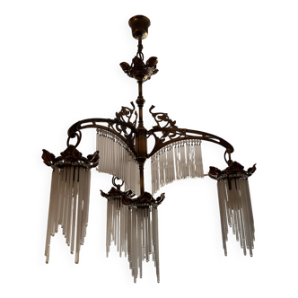 Lustre en laiton et pampilles en cristal