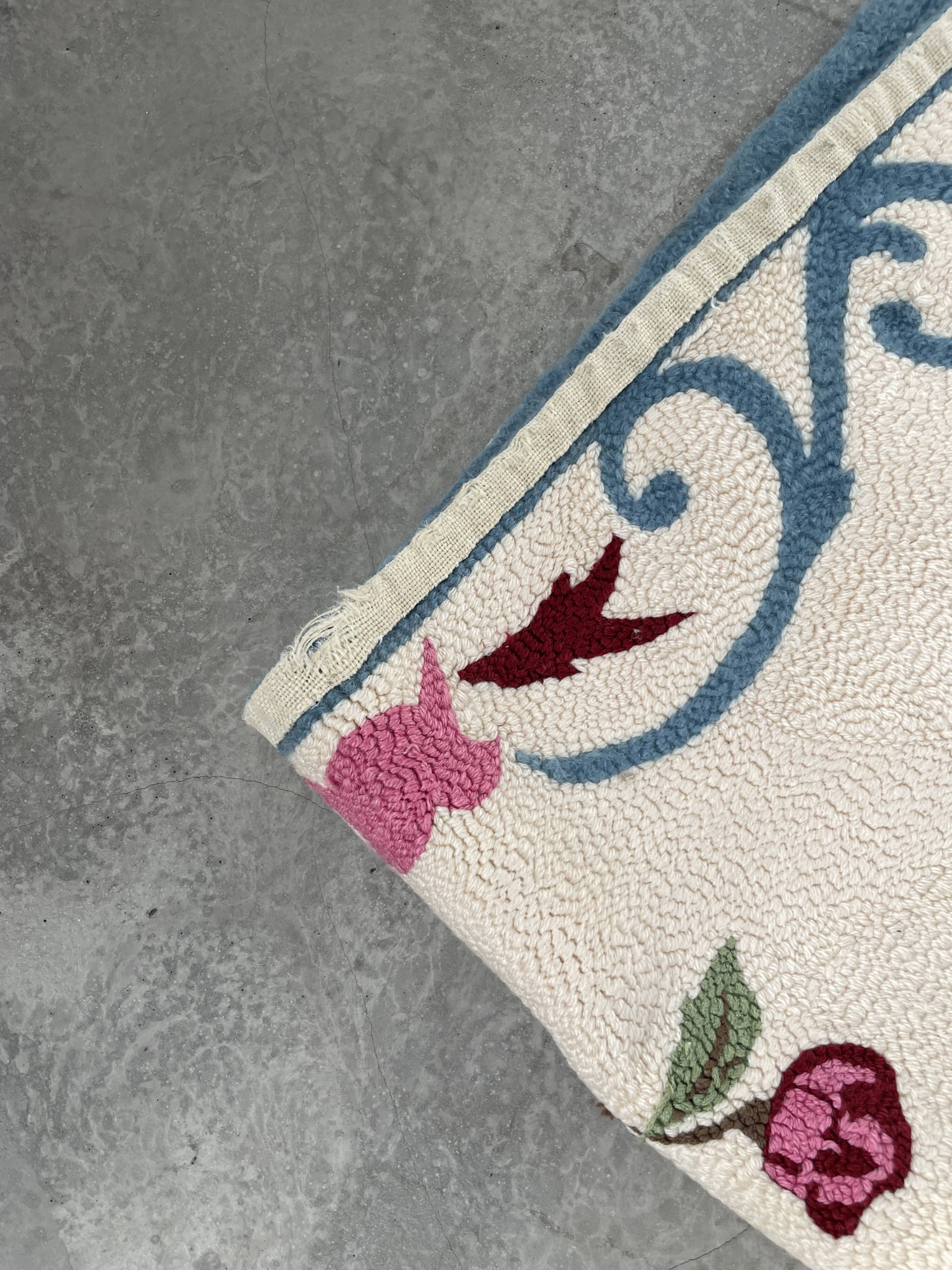 White and blue floral wool rug