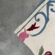 Tapis en laine blanc et bleu fleuri