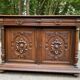 Henri II sideboard in carved wood, 1930.