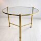 French brass and glass round cocktail table in the style of Maison Baguès