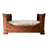 Cherry wood boat bed with bedding