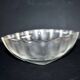 Lalique glass ashtray bowl with frosted finish, engraved with wave design, signed Lalique.