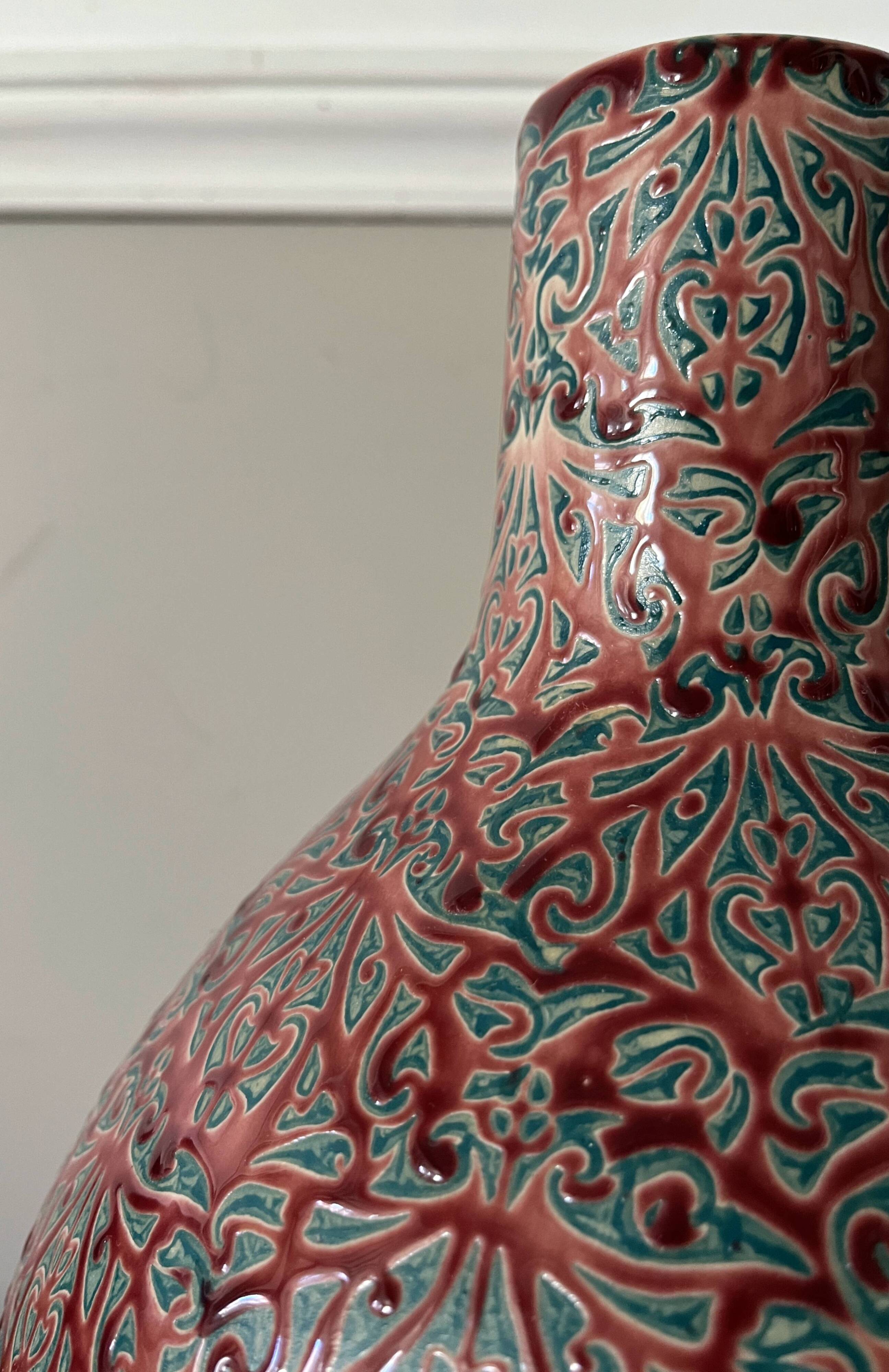 Large ceramic art vase with signed enamel interlacing