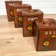 Série de 4 pots à épices en bois
