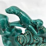 Pair of ART DECO bookends • Glazed earthenware enhanced with touches of fine gold • Circa 1930