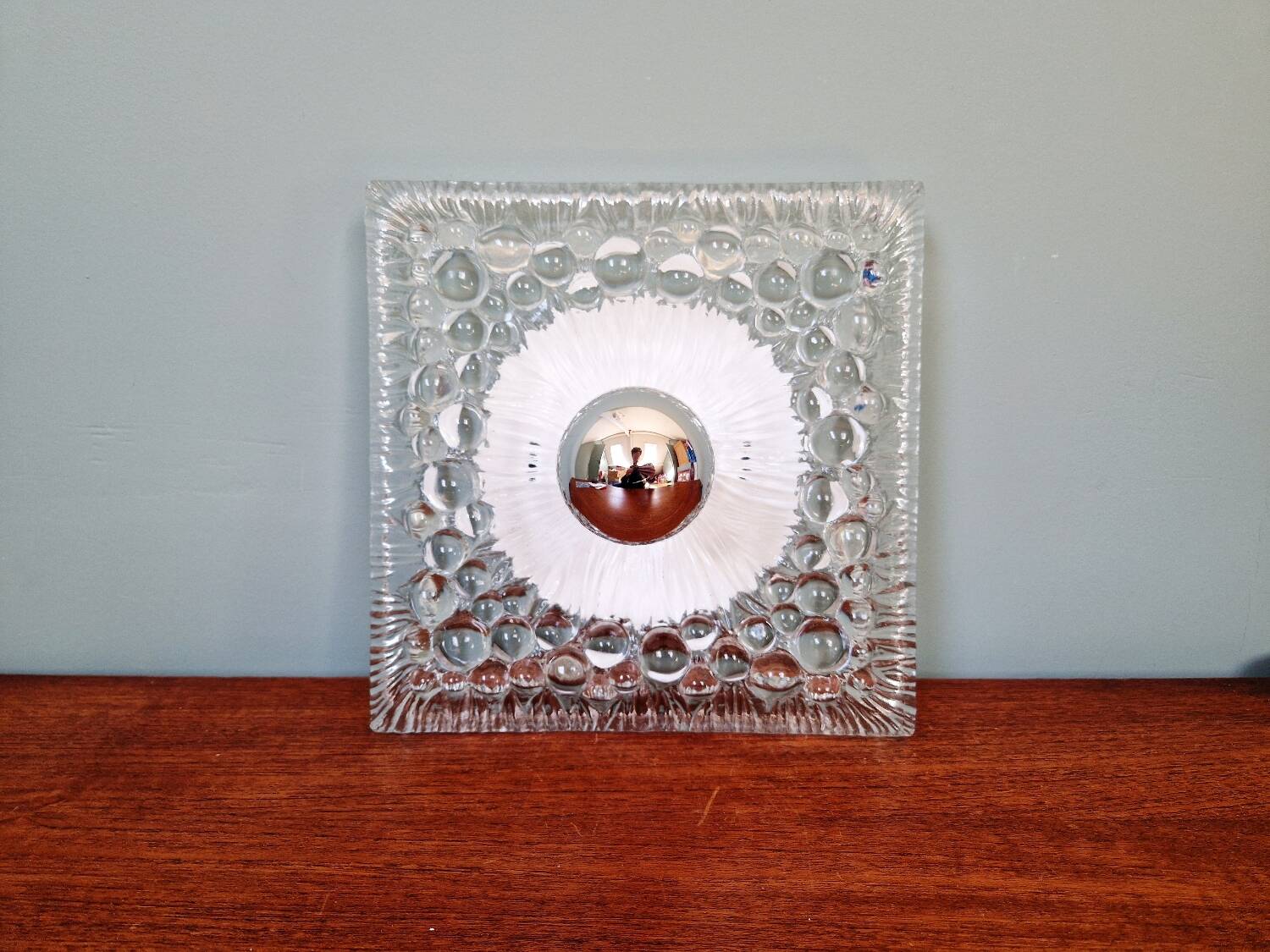 Space Age wall light in pressed transparent moulded glass, 1970.