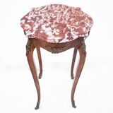 Table with a marble top, France, around 1910.