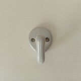 Antique enamelled cast iron wall hook from the 30s/40s