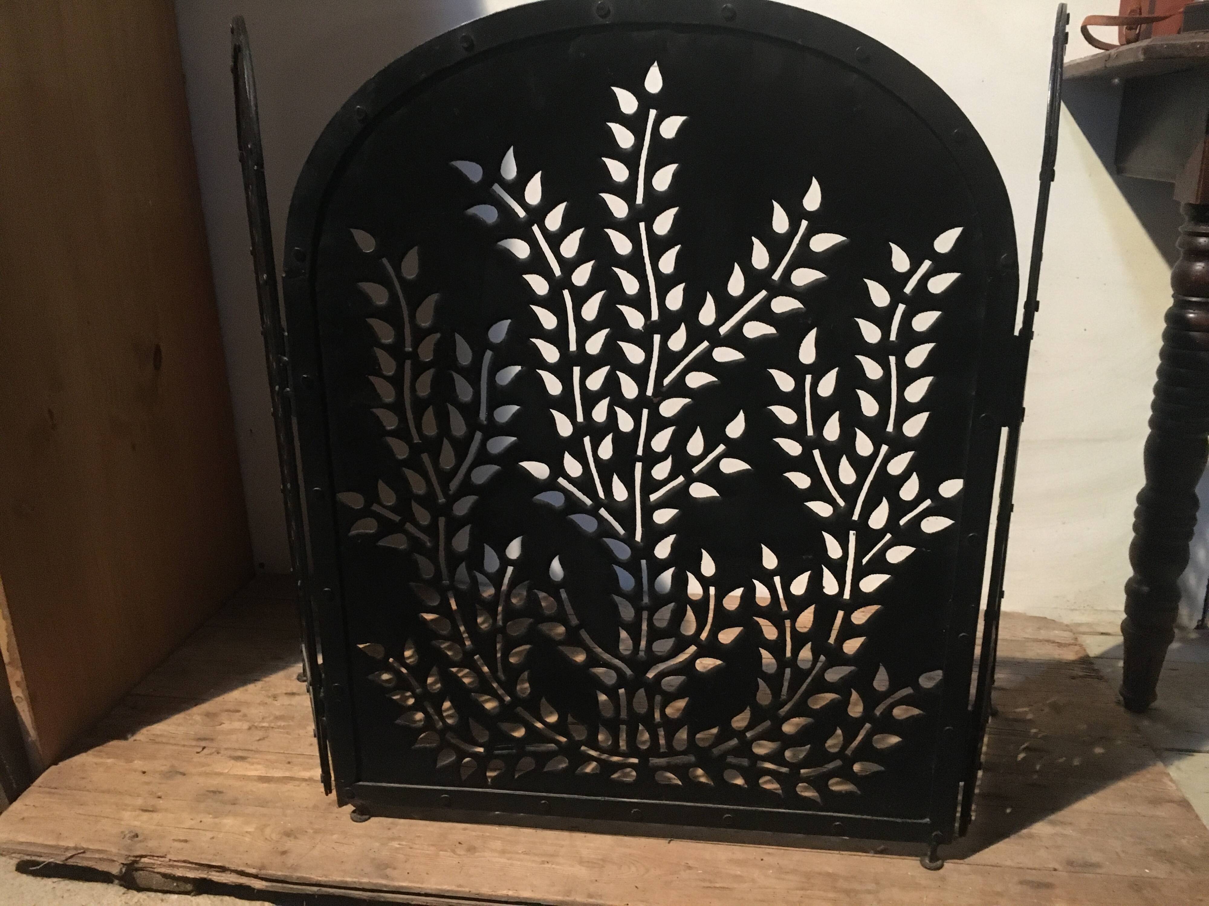 Wrought and cut metal fire screen