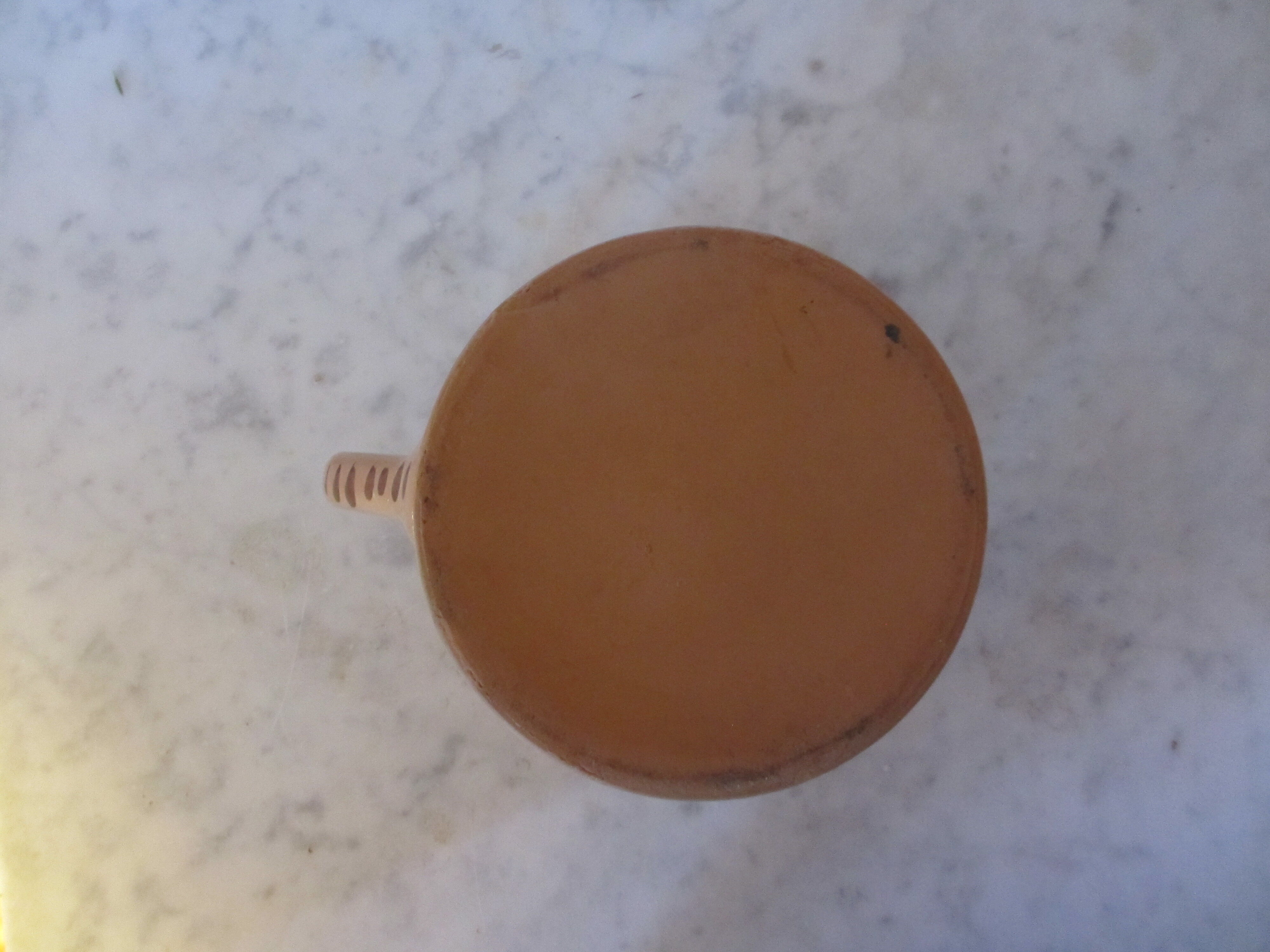 Enamelled earthenware pot