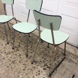 4 green formica chairs
