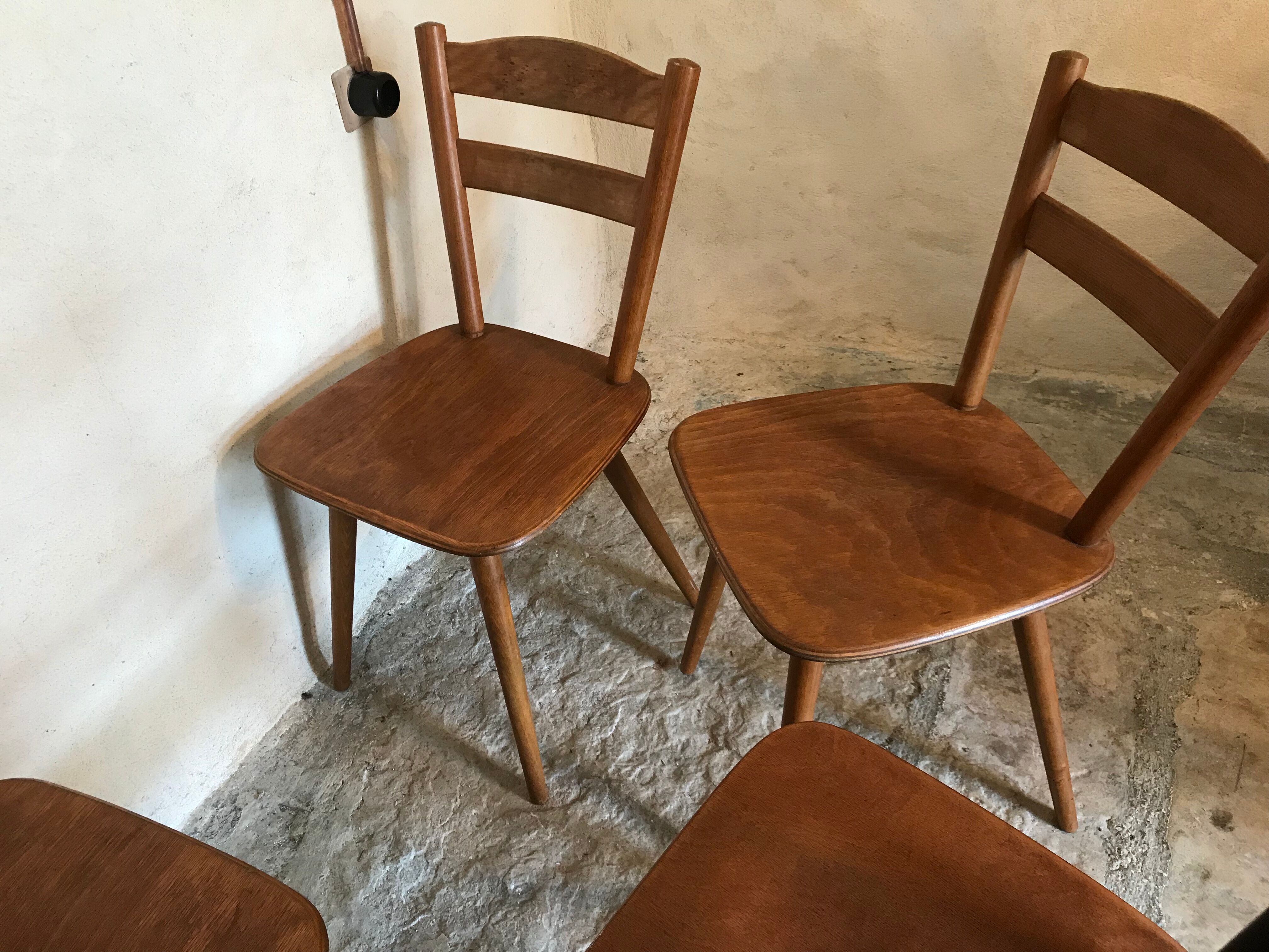 Set of 4 mismatched vintage chairs compass legs