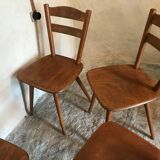 Set of 4 mismatched vintage chairs compass legs