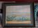 Old painting in oil on canvas depicting a seaside.