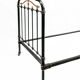 Antique matching pair of antique cast iron single beds in black and gold