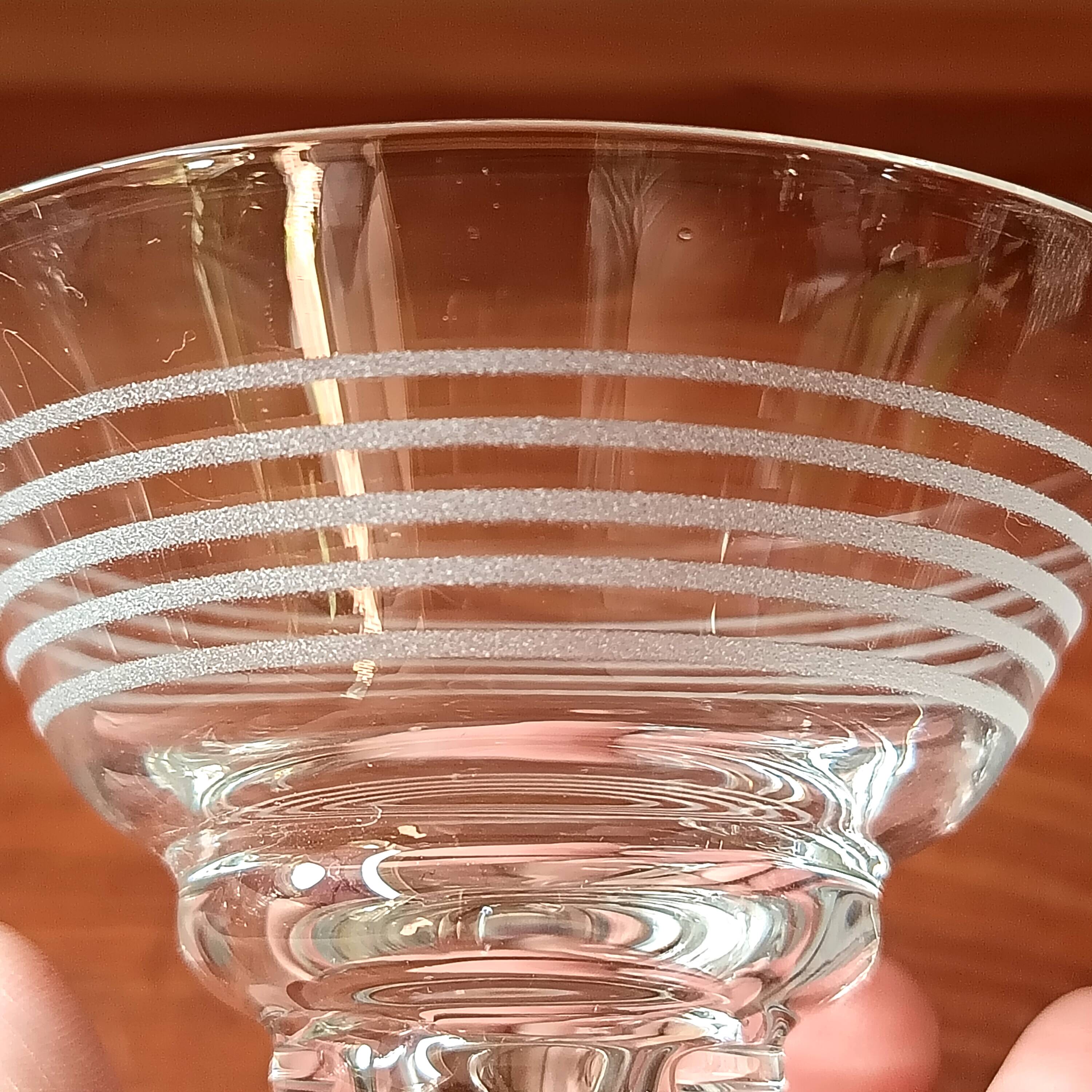 8 conical glasses with a vintage 1950s line pattern.