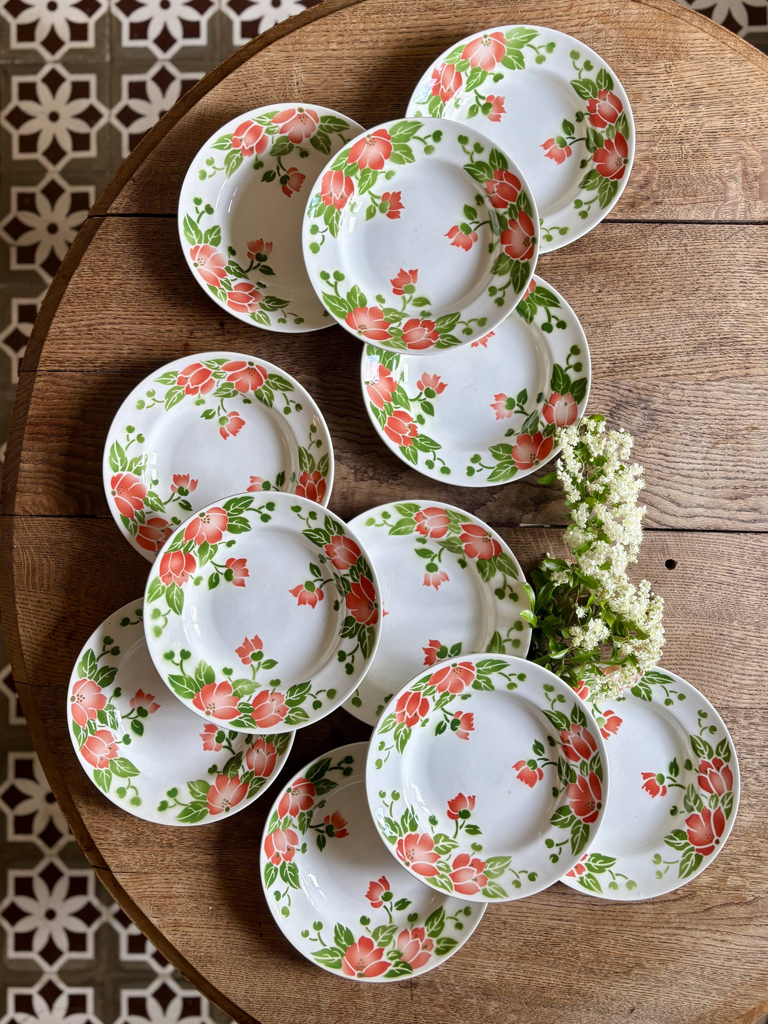 Set of 11 vintage deep plates by Eric de Moulin des Loups.