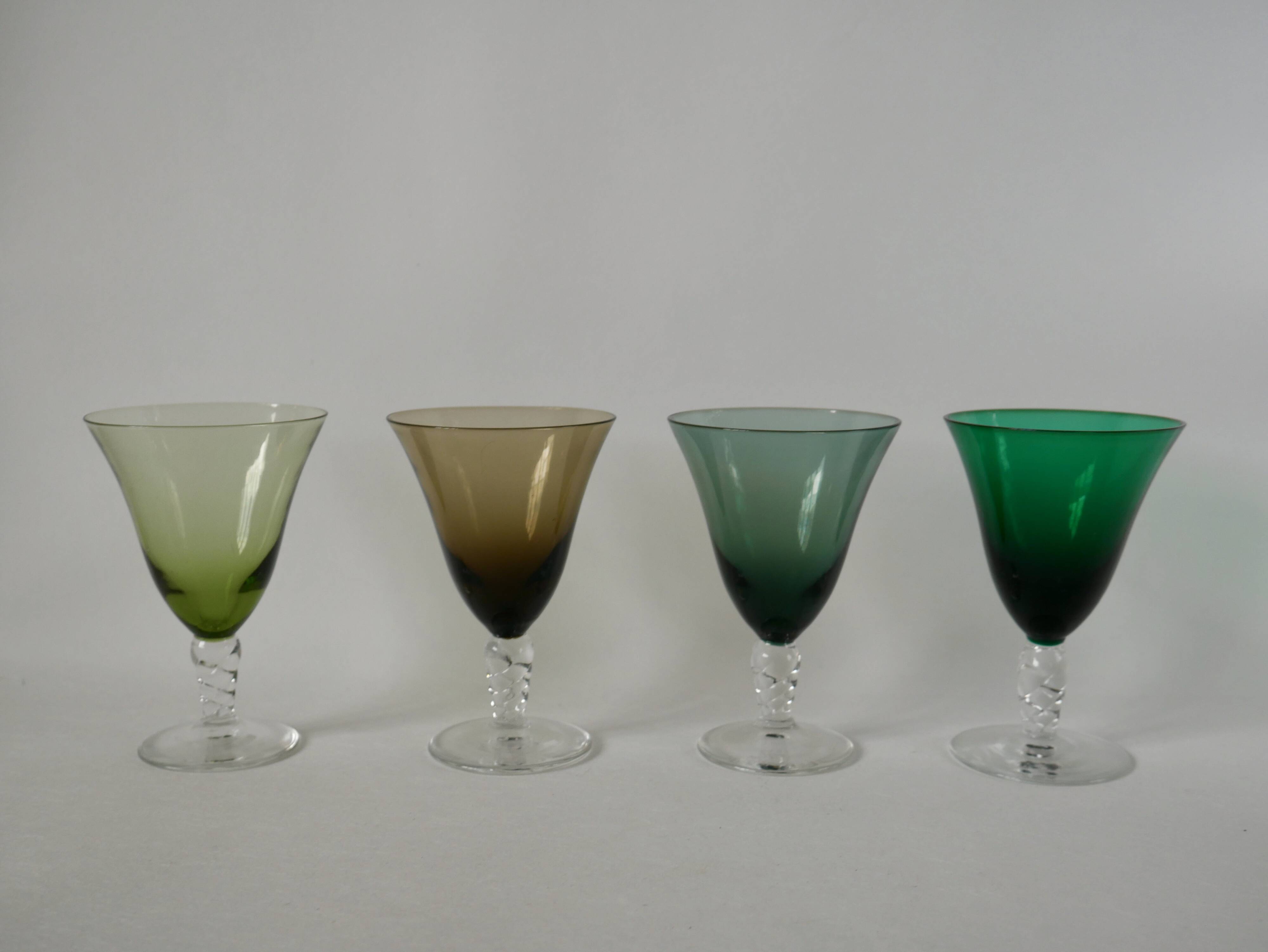 Set of 4 colored wine glasses with worked legs from the 50s